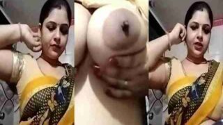 Desi Hindi XXX Sexy Milf Bhabhi shows her big Boobs and wet shaved pussy on camera